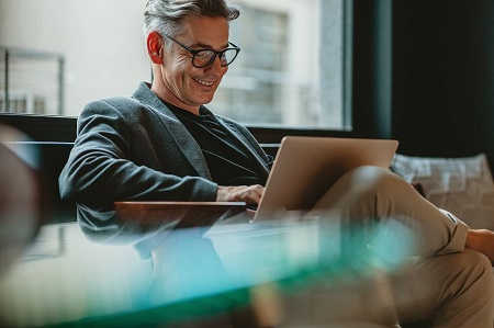 A person enjoying their laptop experience